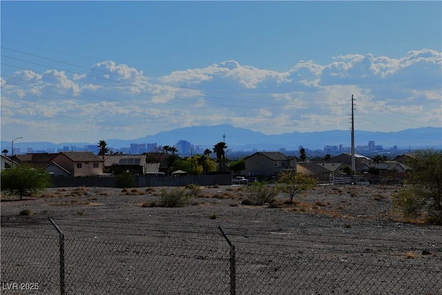 property view of mountains with a residential view