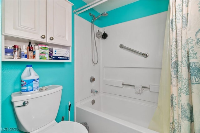 bathroom with shower / tub combo and toilet