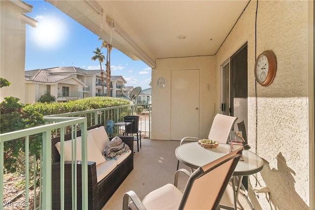 balcony featuring a residential view and outdoor lounge area