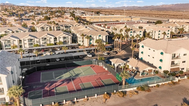 birds eye view of property featuring a mountain view and a residential view