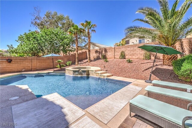 11143 Castellane Dr, Las Vegas, NV 89141 - view of pool featuring a fenced backyard and a pool with connected hot tub