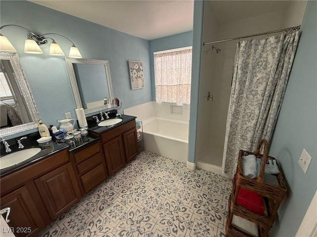 bathroom featuring double vanity, a sink, a bath, and a shower stall