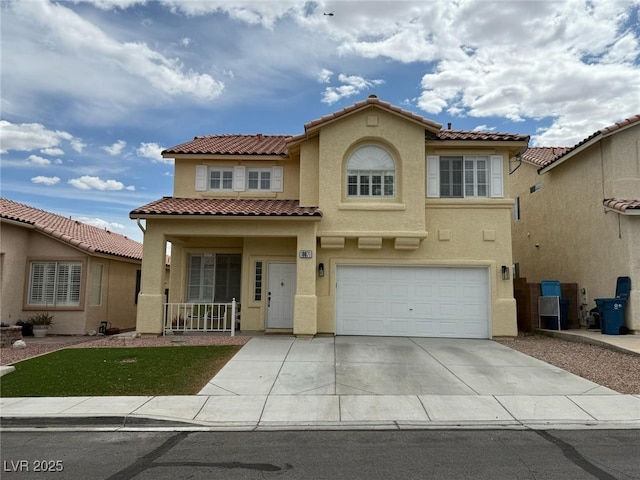 mediterranean / spanish home featuring a tile roof, a garage, stucco siding, a porch, and driveway