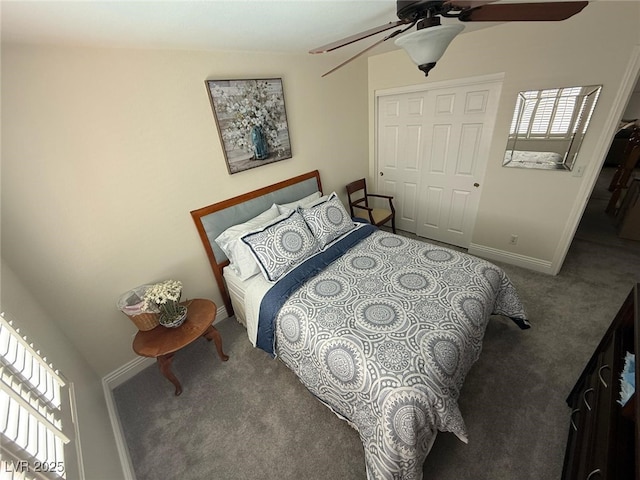 carpeted bedroom featuring baseboards and a ceiling fan