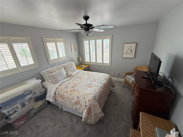 bedroom featuring baseboards, carpet, and ceiling fan