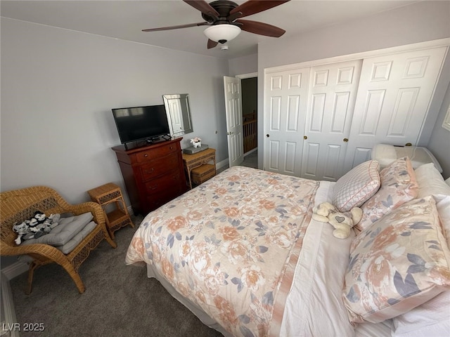 carpeted bedroom with a closet and a ceiling fan