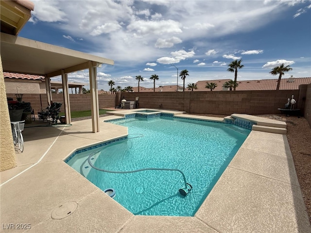 10071 Lemon Valley Ave, Las Vegas, NV 89147 - view of swimming pool with a patio, a fenced backyard, and a pool with connected hot tub