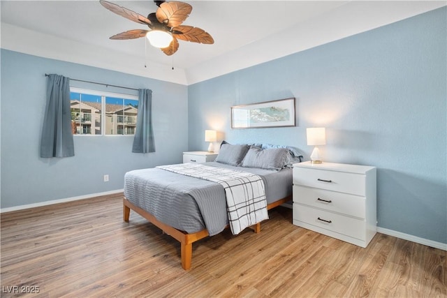 3550 Bay Sands Dr Unit 2101, Laughlin, NV 89029 - bedroom with baseboards, ceiling fan, and light wood-style floors