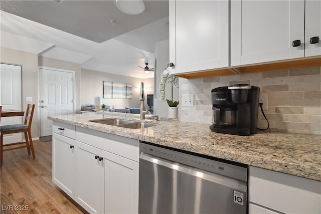 3550 Bay Sands Dr Unit 2101, Laughlin, NV 89029 - kitchen featuring a ceiling fan, stainless steel dishwasher, a sink, white cabinets, and light wood-style floors