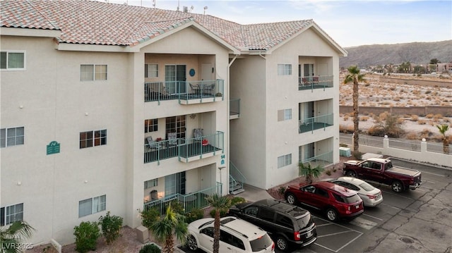 3550 Bay Sands Dr Unit 2101, Laughlin, NV 89029 - view of building exterior with a mountain view and uncovered parking