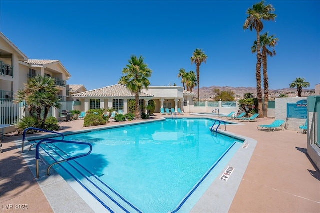 3550 Bay Sands Dr Unit 2101, Laughlin, NV 89029 - pool featuring fence, a mountain view, and a patio area