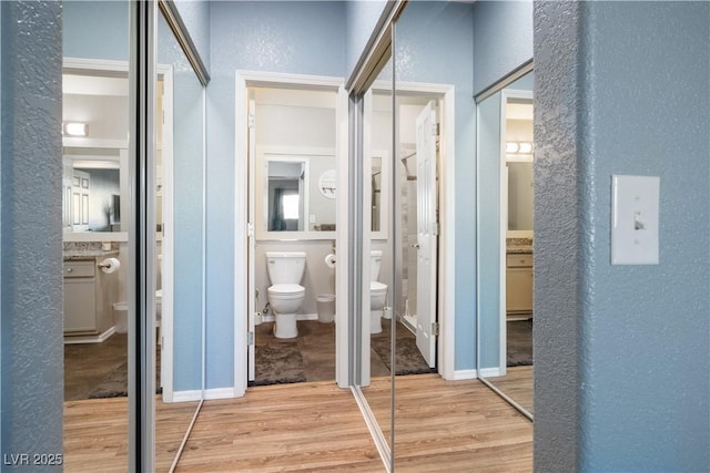 3550 Bay Sands Dr Unit 2101, Laughlin, NV 89029 - bathroom with a textured wall, toilet, and wood finished floors