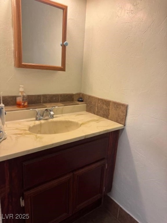 bathroom with vanity and tile patterned floors