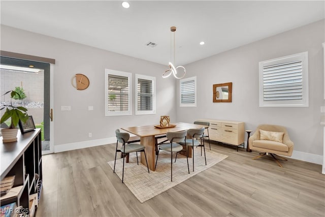 dining room with visible vents, recessed lighting, light wood-style flooring, and baseboards
