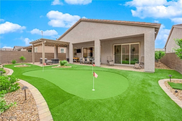 back of house with a pergola, a fenced backyard, stucco siding, central AC unit, and a patio area