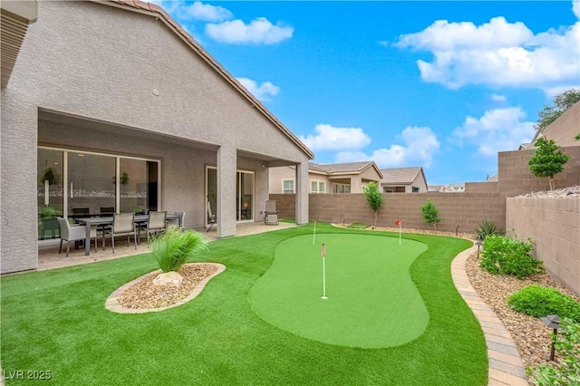view of yard featuring a fenced backyard and a patio area