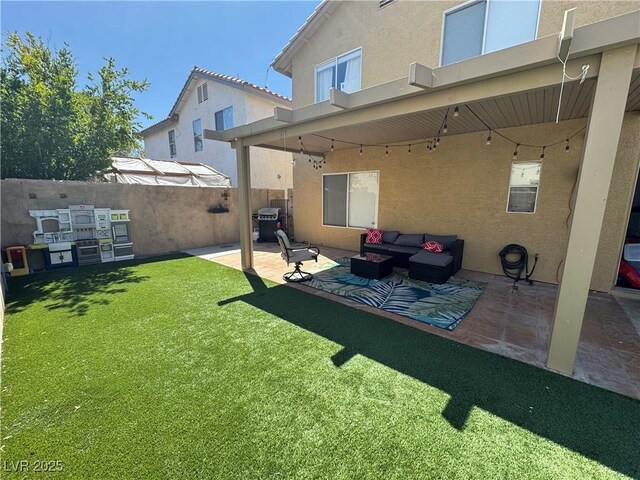 back of property featuring stucco siding, a patio, and outdoor lounge area