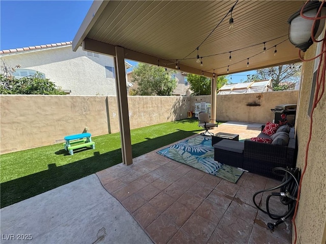 view of patio with a fenced backyard and outdoor lounge area