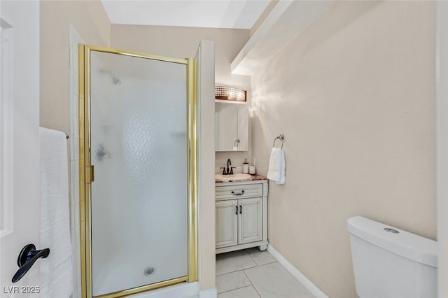full bath featuring vanity, toilet, marble finish floor, baseboards, and a shower stall