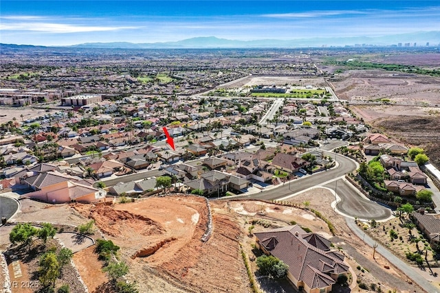 bird's eye view featuring a residential view and a mountain view
