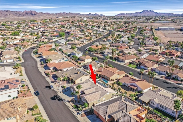 aerial view featuring a residential view and a mountain view