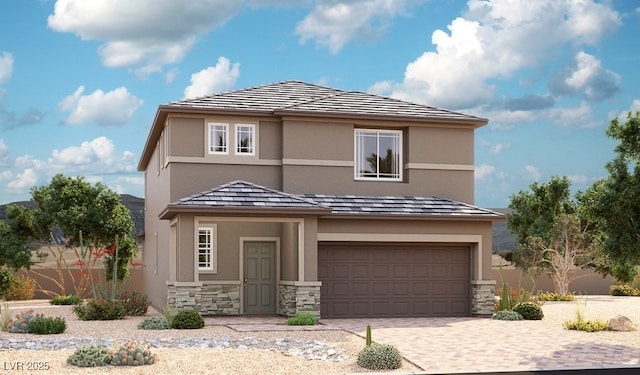 view of front facade with a garage, stucco siding, driveway, and stone siding