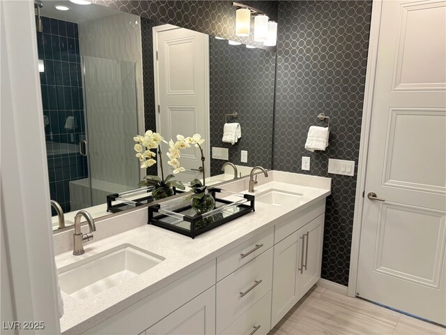 929 Hunter Shores Ave, North Las Vegas, NV 89084 - bathroom featuring double vanity and tiled shower