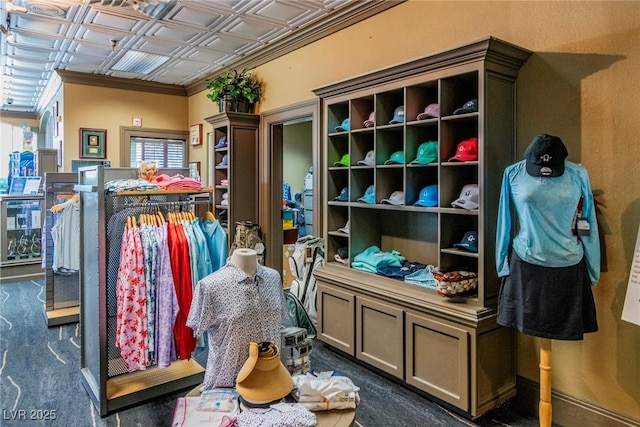 walk in closet with carpet flooring