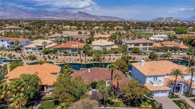 aerial view featuring a mountain view and a residential view