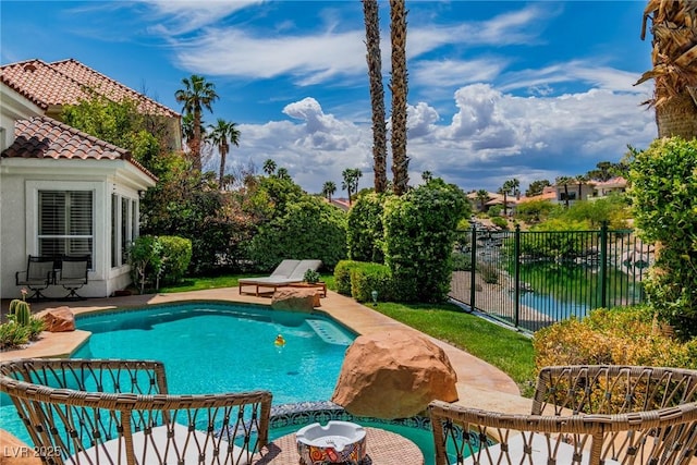 view of pool with fence, a patio area, and a fenced in pool