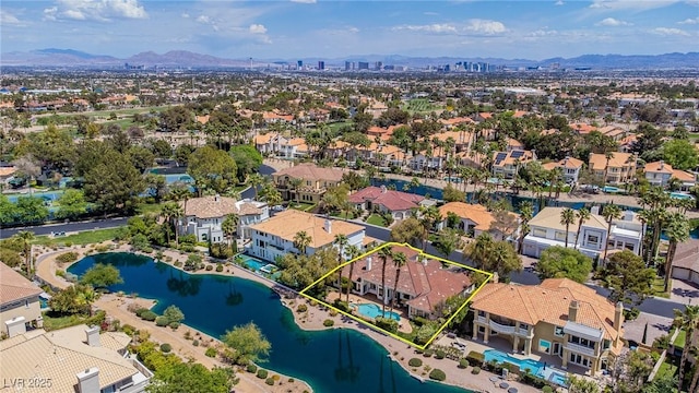 aerial view with a water and mountain view