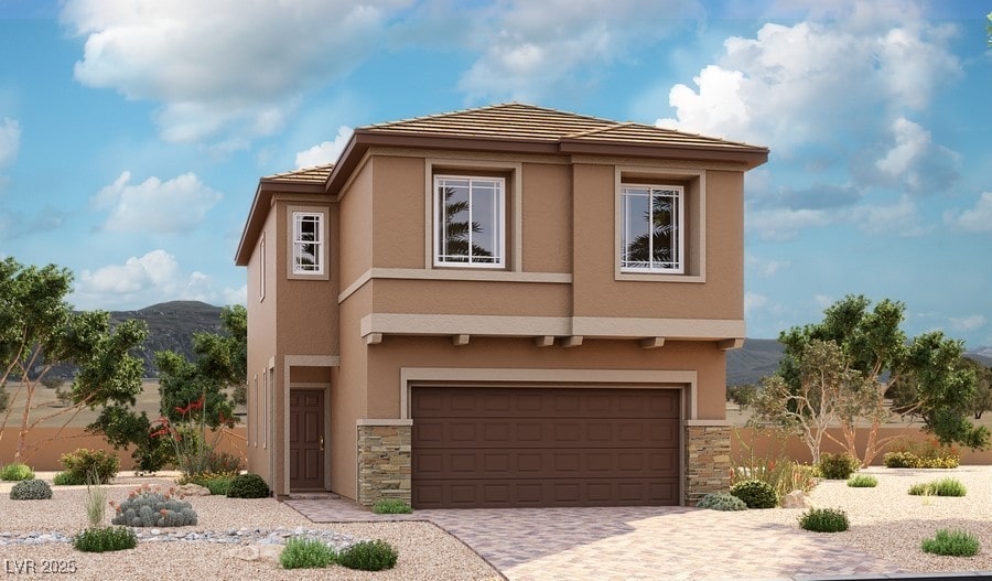 view of front of house featuring a garage, stucco siding, driveway, and stone siding