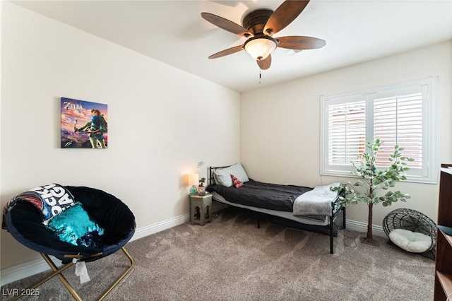 bedroom featuring baseboards, a ceiling fan, and carpet