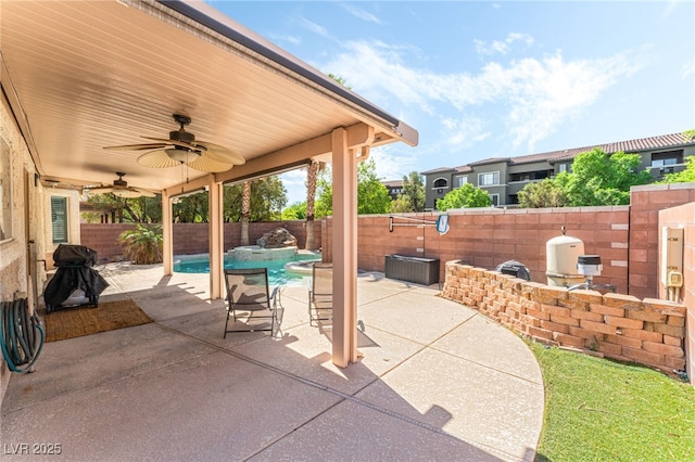 view of patio / terrace featuring a fenced backyard, ceiling fan, and area for grilling