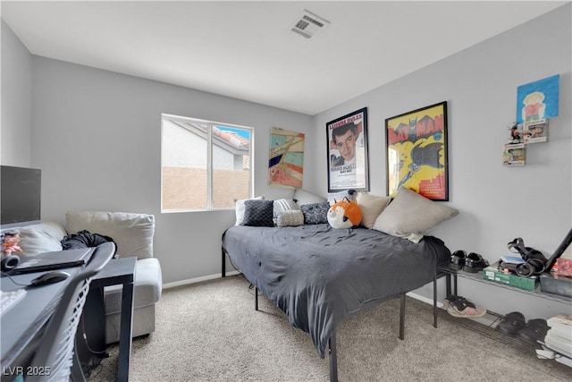 carpeted bedroom with baseboards and visible vents