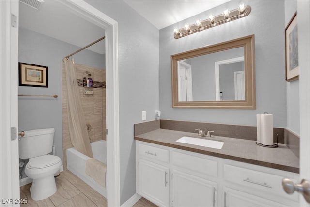 full bathroom featuring vanity, shower / bath combo with shower curtain, visible vents, and toilet