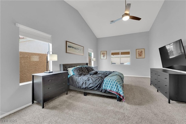 bedroom with high vaulted ceiling, ceiling fan, baseboards, and carpet floors
