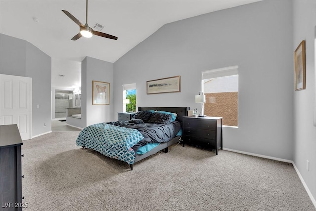 carpeted bedroom featuring baseboards, connected bathroom, visible vents, and high vaulted ceiling