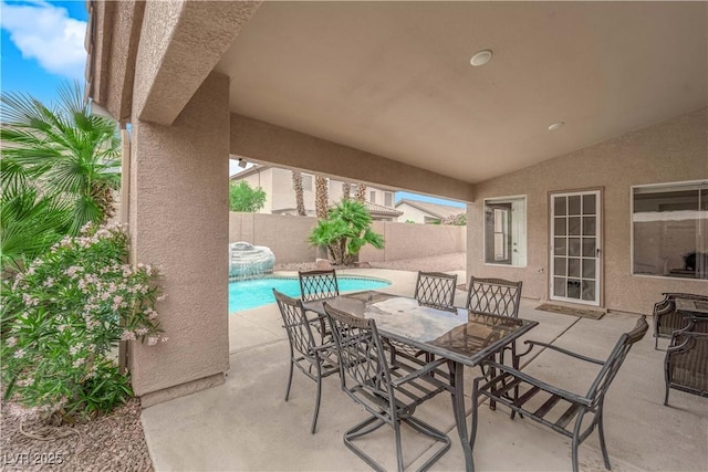 view of patio featuring a fenced in pool and a fenced backyard