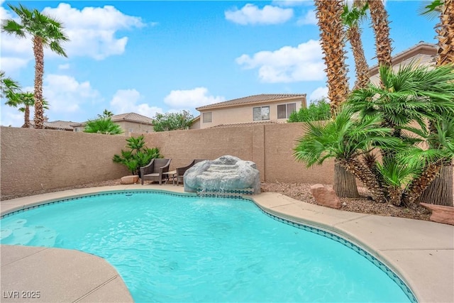 view of pool featuring a fenced in pool and a fenced backyard