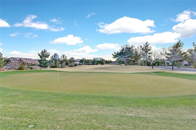 7908 House Sparrow St, North Las Vegas, NV 89084 - surrounding community featuring a lawn and golf course view