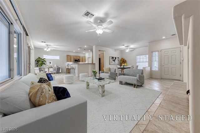 2056 Oliver Springs St, Henderson, NV 89052 - living area featuring a ceiling fan, light tile patterned floors, and recessed lighting