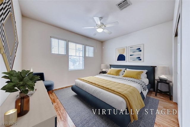 2056 Oliver Springs St, Henderson, NV 89052 - bedroom with wood finished floors and a ceiling fan