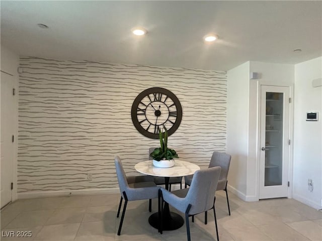 dining space with baseboards
