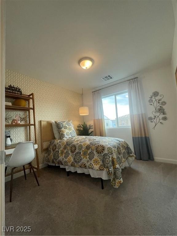 carpeted bedroom featuring baseboards, wallpapered walls, and visible vents