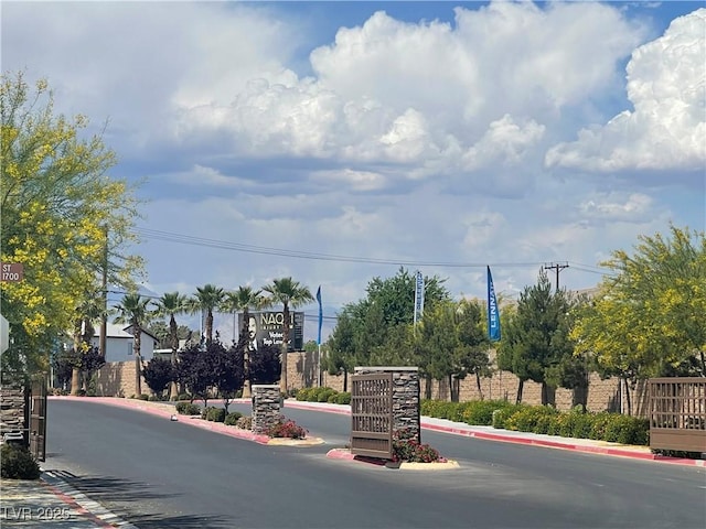 view of road with curbs and sidewalks