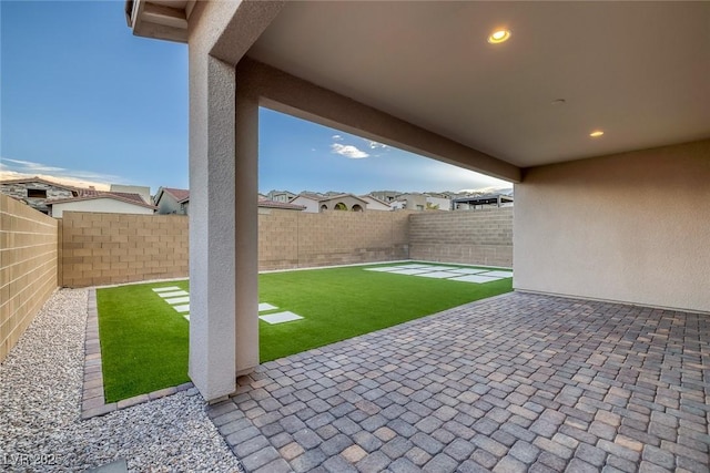 view of patio with a fenced backyard