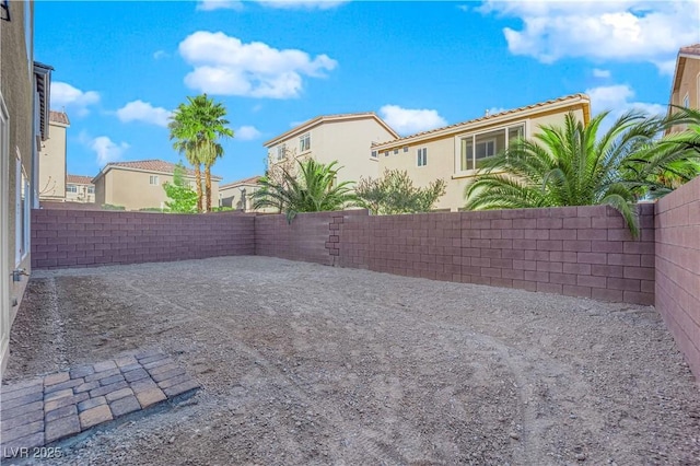 6142 Kelson Creek Ct, Las Vegas, NV 89118 - view of yard with a fenced backyard and a residential view