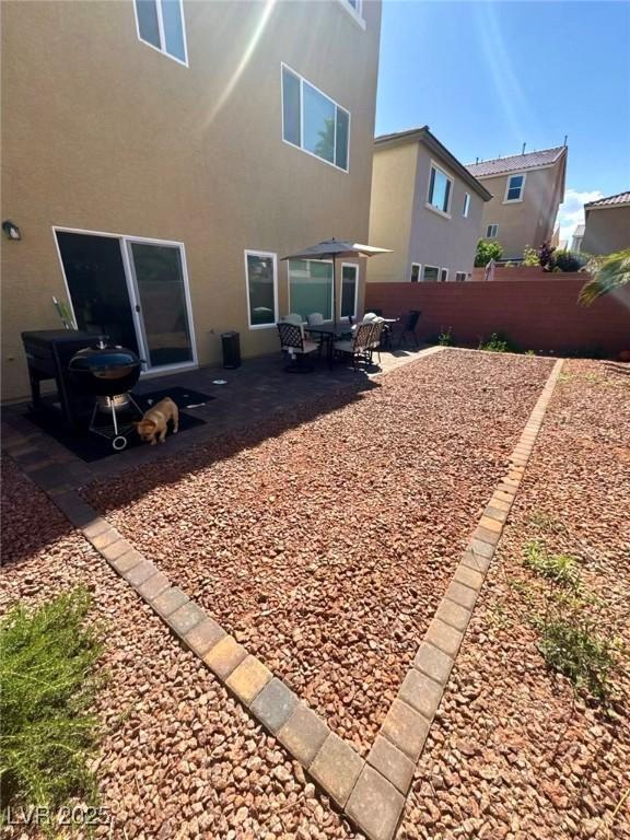 6142 Kelson Creek Ct, Las Vegas, NV 89118 - view of yard with a patio area and fence