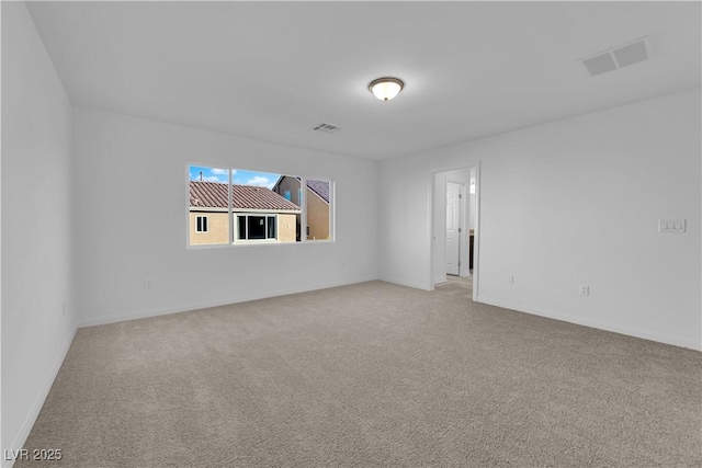 6142 Kelson Creek Ct, Las Vegas, NV 89118 - spare room with baseboards, light carpet, and visible vents